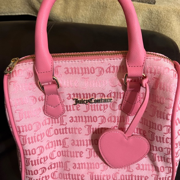 Juicy Couture Handbags - Juicy Couture Pink Satchel with Heart Charm